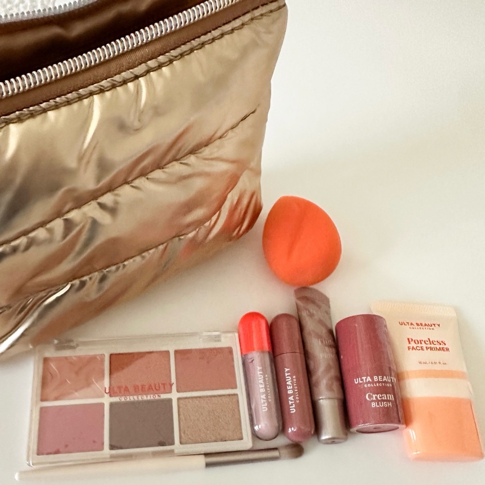 Ulta Beauty Collection gold puffy makeup bag with items